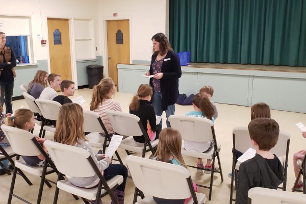 Carolyn explains the Minute-to-Win-It Games!