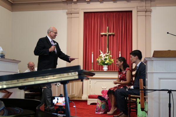 Dick presents the financial gift.